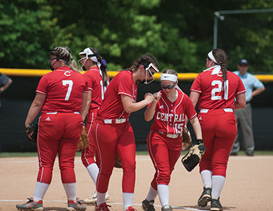 Perry Central’s Katie Campbell (13) and Allanh Hurt (15) fist bump
